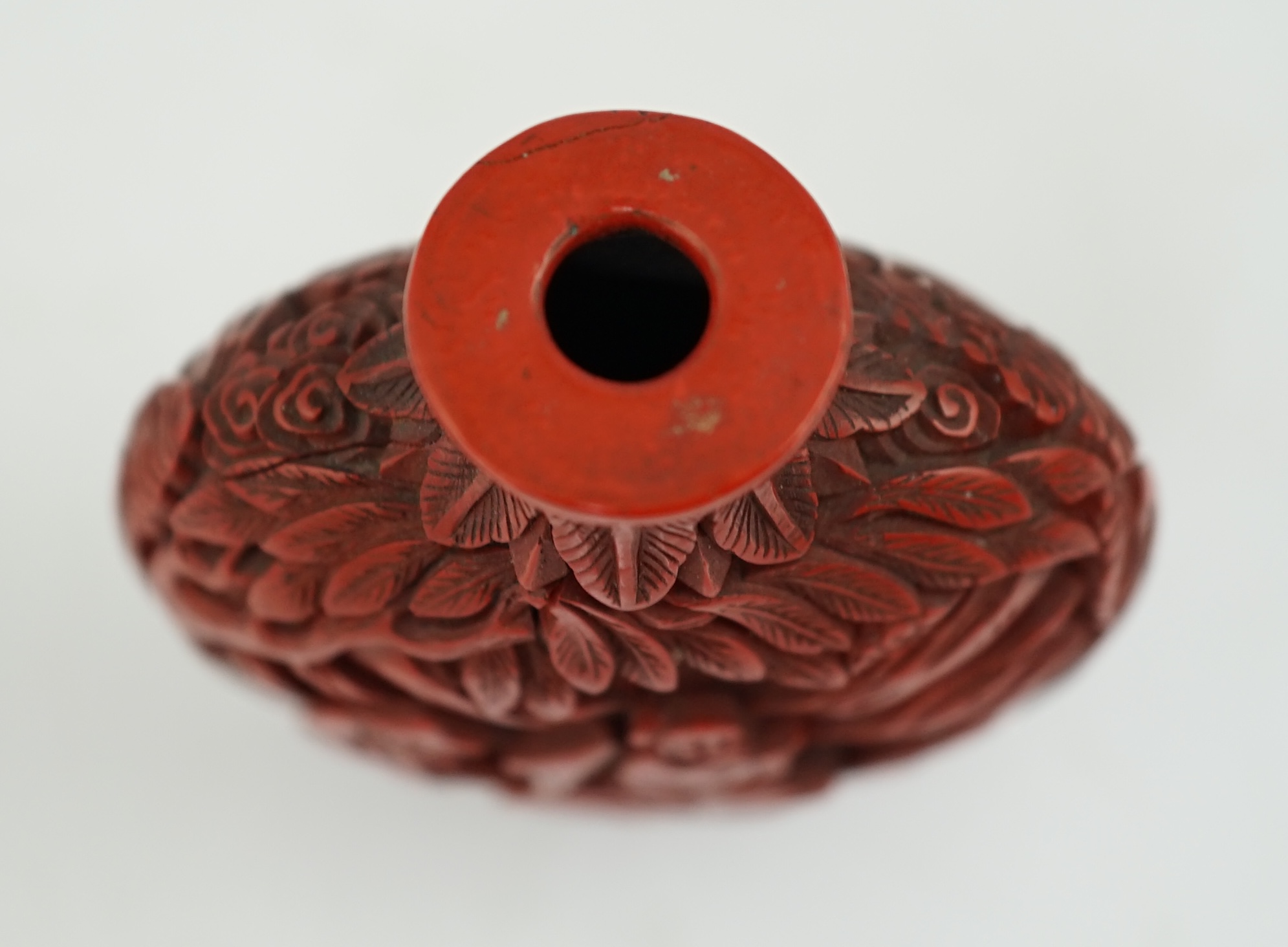 A Chinese cinnabar lacquer snuff bottle, 19th century, minor damage